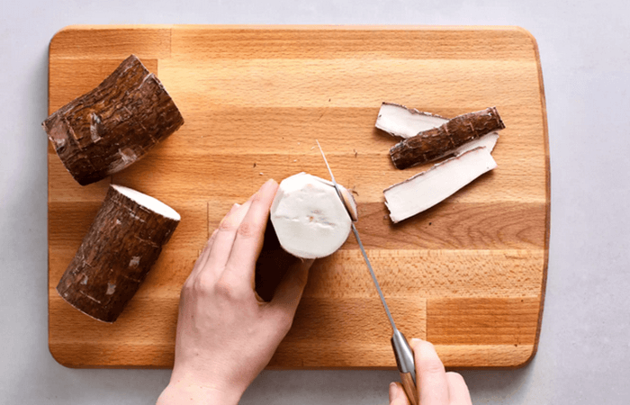 traditional manual cassava peeling